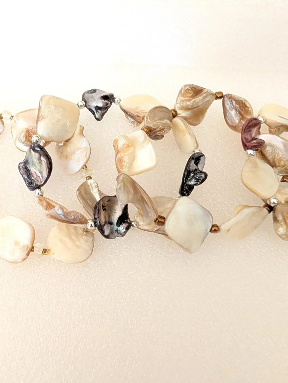 Set of 4 polished shell stretch bracelets-neutral tones